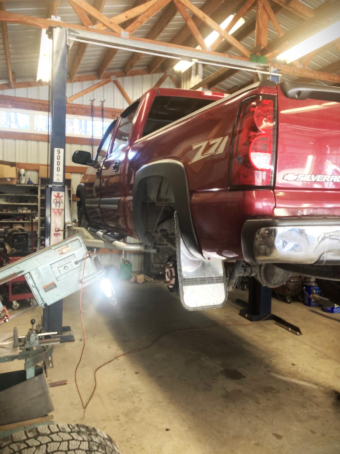 Vehicle up on lift for service and inspection