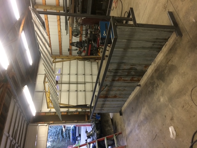 Steel bar frame standing upright in shop