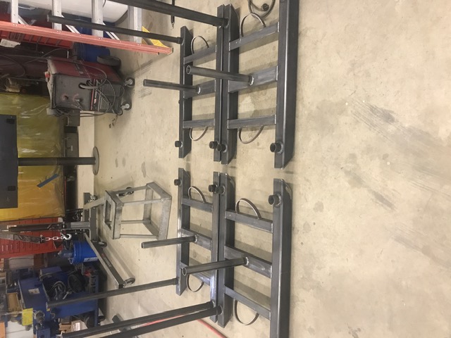 Two custom fabricated steel push and pull workout training sleds